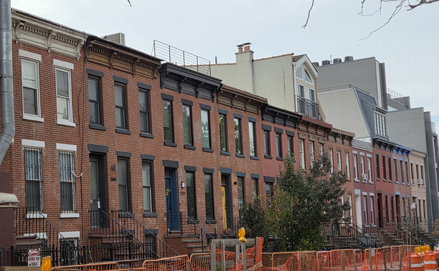 A row of 2-family houses built before 1901