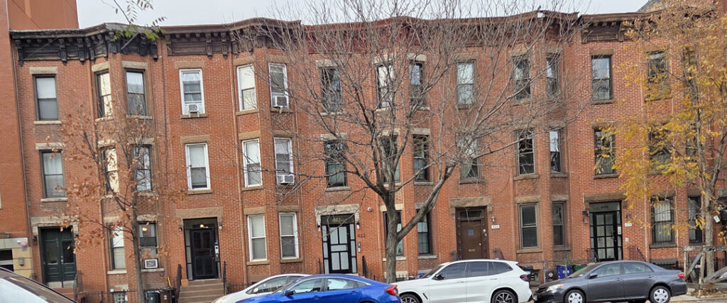 Photo of 3-story, historic, brick, rowhouses